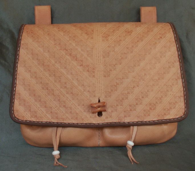 16th - 17th century medium belt wallet with a tooled square front and two pouchlets