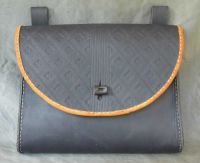 16th - 17th century belt wallet with a  tooled round front and side gussets
