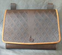 16th - 17th century belt wallet with a  tooled square front and side gussets